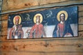 An old painted icon depicting three Saints Royalty Free Stock Photo