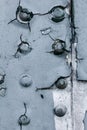 Old painted metal background detail of a military aircraft, surface corrosion. Royalty Free Stock Photo