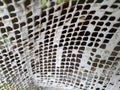 Old painted metal fencing mesh. Royalty Free Stock Photo