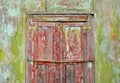 Old painted wall with window shutters closed Royalty Free Stock Photo