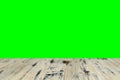 Old painted washed oak wood table on the blurry chroma key green screen wall background, wooden table