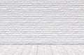 White brick wall and wood floor background Royalty Free Stock Photo