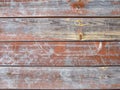 Old painted wooden red brown gray background. Weathered cracked texture. Royalty Free Stock Photo