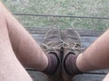 An old pair of shoes worn by a typical farmer