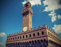 Old Palace and clock tower with blue sky in Florence Italy Royalty Free Stock Photo