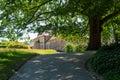 Old palace and tree in park at Hermitage (Eremitage) Museum in Bayreuth, Bavaria, Germany Royalty Free Stock Photo