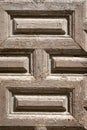 Old paneled wooden door; rusty and weathered. Wood Texture Background Royalty Free Stock Photo