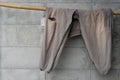 Old pants hung on clothes