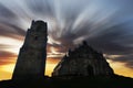 Old historic Paoay Church during sunrise with moving clouds