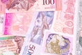 Old banknotes from various exotic countries. Colorful paper money background. Close-up macro Royalty Free Stock Photo