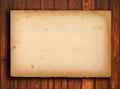 Old paper on brown wood texture with natural patte Royalty Free Stock Photo