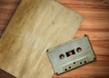 Old paper and cassette Royalty Free Stock Photo