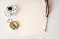 Old paper with compass and quill pen top view photo Royalty Free Stock Photo