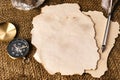 Old paper with compass and quill pen top view photo Royalty Free Stock Photo