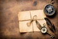 old paper, compass and quill on a wooden background. vintage style, copy space Royalty Free Stock Photo