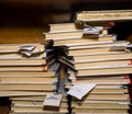 Old paper documents stacked in archive. Documents on the shelves of archive room. Office shelves in the closet full of files Royalty Free Stock Photo