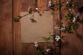 Old paper and flower on wooden background Royalty Free Stock Photo