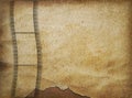 Old paper in grunge style with filmstrip Royalty Free Stock Photo