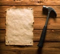 Old Paper and Hammer Royalty Free Stock Photo