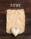 Old paper, heart and word Love Royalty Free Stock Photo