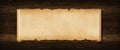Old paper horizontal banner. Parchment scroll on a wood board Royalty Free Stock Photo