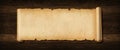 Old paper horizontal banner. Parchment scroll on a wood board