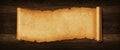 Old paper horizontal banner. Parchment scroll on a wood board Royalty Free Stock Photo