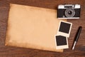 Old paper, ink pen and vintage photo frame with camera Royalty Free Stock Photo