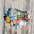 Old paper and photos on wooden background. Royalty Free Stock Photo