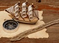 Old paper, rope and model classic boat Royalty Free Stock Photo