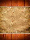 Old paper sheet on wooden background Royalty Free Stock Photo