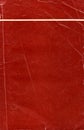 Old paper texture. Red book cover. Rough faded surface. Blank retro page. Royalty Free Stock Photo