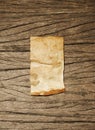 Old paper on wood texture Royalty Free Stock Photo