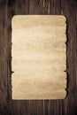 Old paper on wood texture Royalty Free Stock Photo