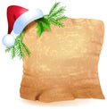 Old parchment and Christmas hat Royalty Free Stock Photo