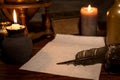 Old parchment paper with a quill and ink, medieval theme Royalty Free Stock Photo