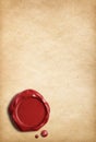 Old parchment paper with red wax seal