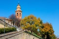 Old parish church and autumnal trees in Piedmont, Italy. Royalty Free Stock Photo