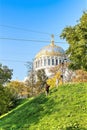 Russia, Kronstadt, September 2020. Old park and view of the dome of the naval cathedral.