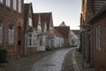 Old part of town with a cobblestone road Royalty Free Stock Photo