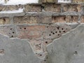 Old partly destroyed brick wall covered with hoarfrost and snow Royalty Free Stock Photo