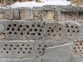 Old partly destroyed brick wall covered with hoarfrost and snow Royalty Free Stock Photo