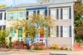 Row of traditional pastel wooden houses on a sunny autumn day Royalty Free Stock Photo