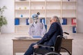 Old patient in wheel-chair visiting devil doctor Royalty Free Stock Photo