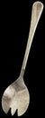 Old Patinated Stainless Steel Salad Fork Isolated On Black Background