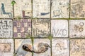 Old patterned tiles with abstract pictures