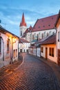 Old paved street in the historical downtown on a winter evening. Town of Znojmo, Czech Republic. Royalty Free Stock Photo