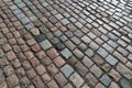 Old paving stones pattern. Texture of ancient german cobblestone in city downtown. Little granite tiles. Antique gray pavements