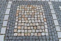 Old paving stones pattern. Texture of ancient german cobblestone in city downtown. Little granite tiles. Antique gray pavements