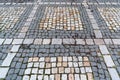 Old paving stones pattern. Texture of ancient german cobblestone in city downtown. Little granite tiles. Antique gray pavements